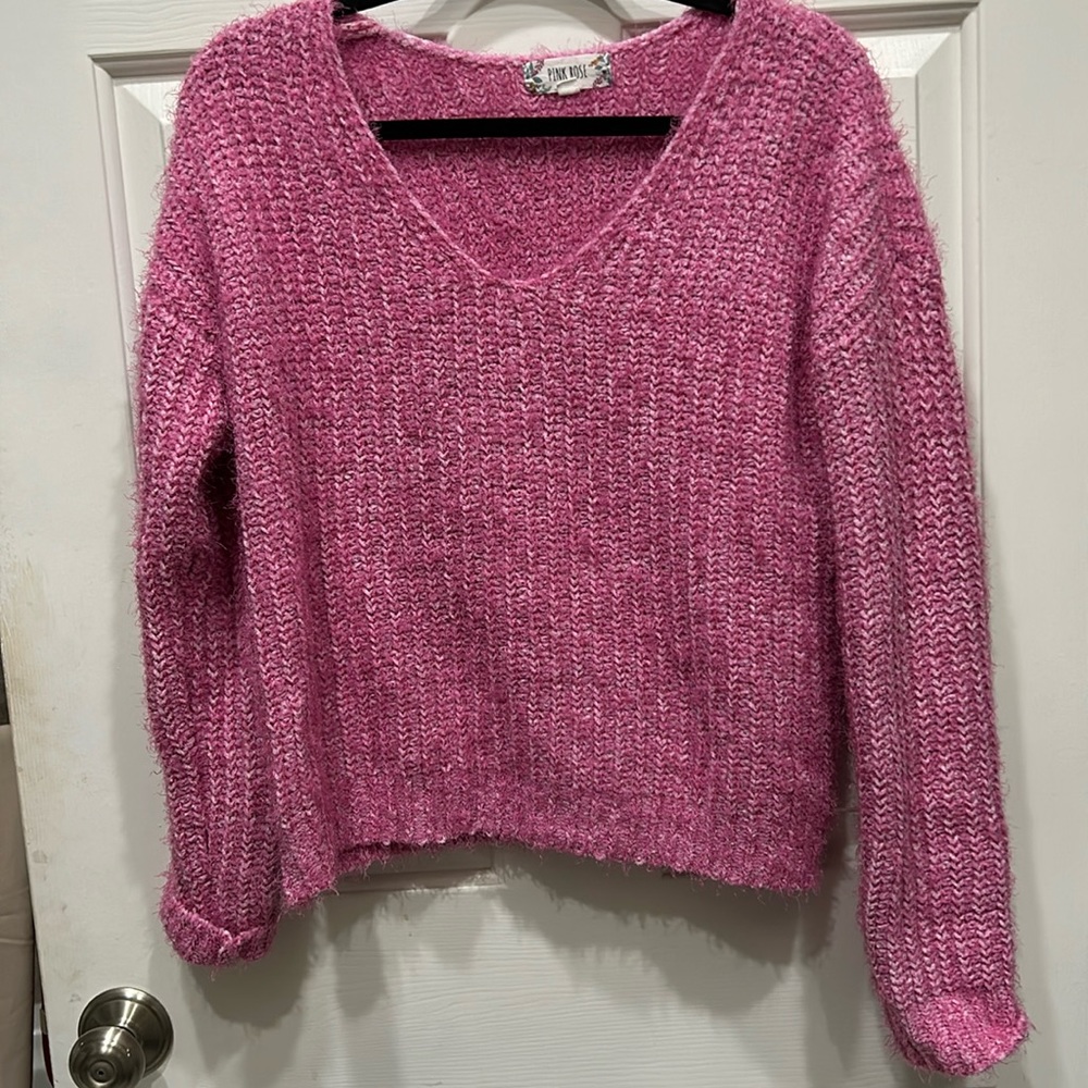 pink fuzzy sweater